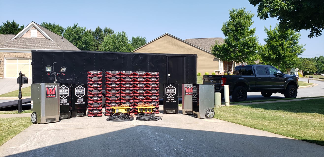 Structural drying equipment deployed after sewage cleanup sanitation in a residential loss.